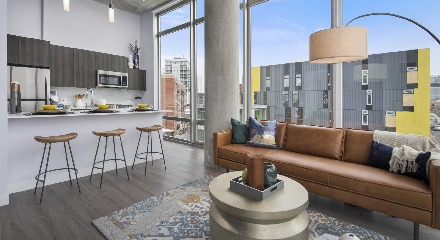 a living room with a couch and a table