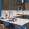 a kitchen with a refrigerator and a table