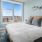 a bedroom with a large window